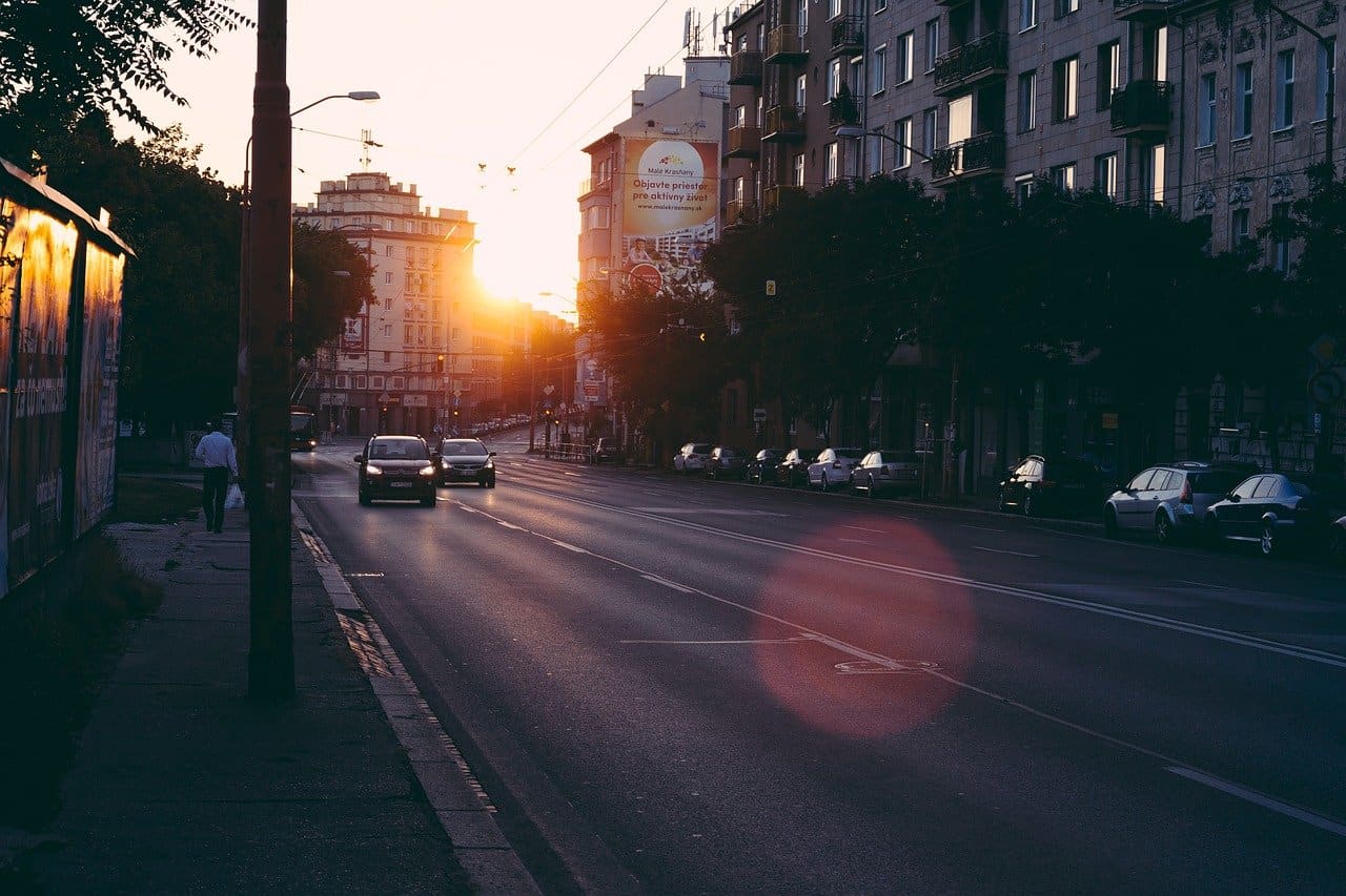 Cars on a street at dawn