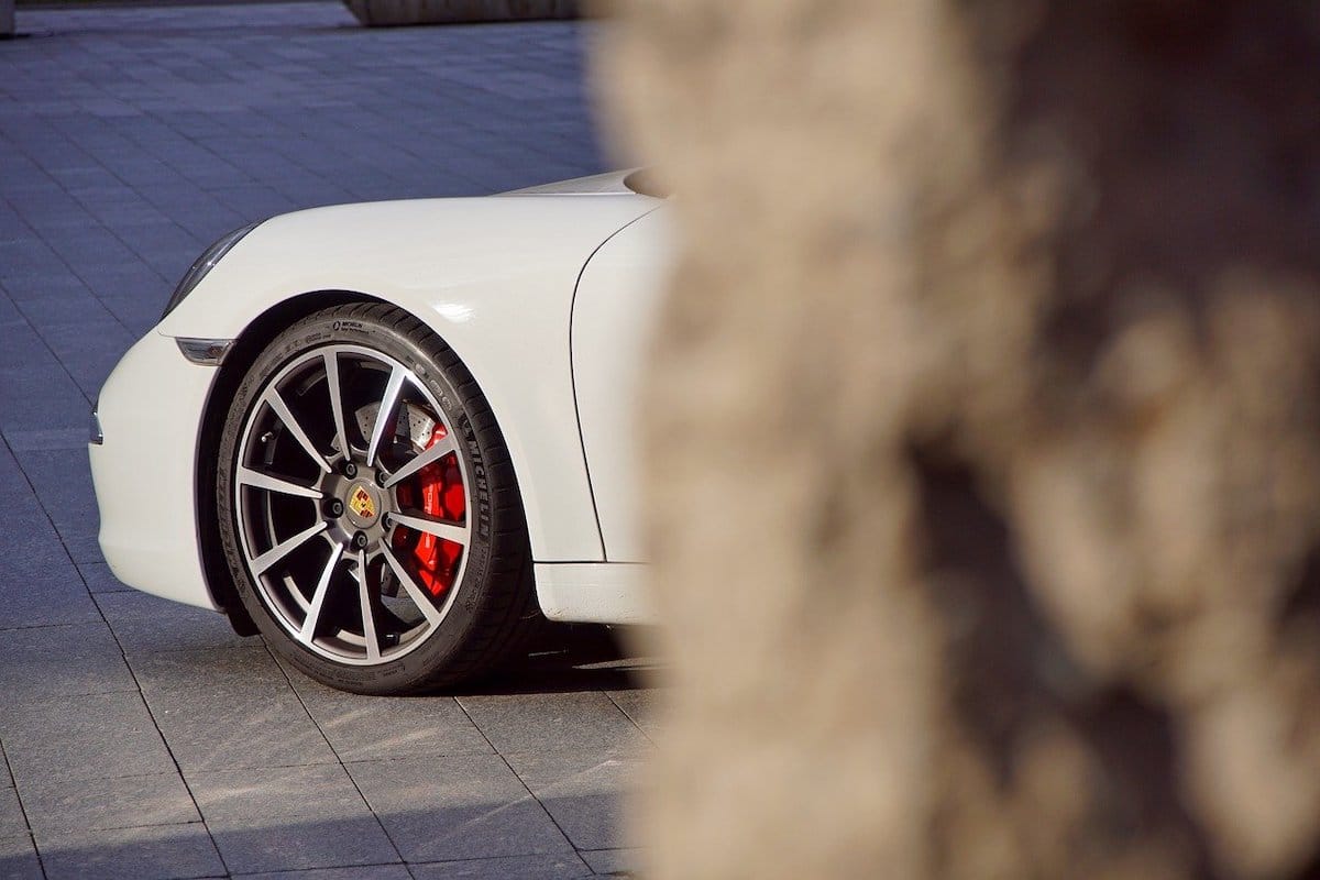 Front nearside wing of a White Porsche