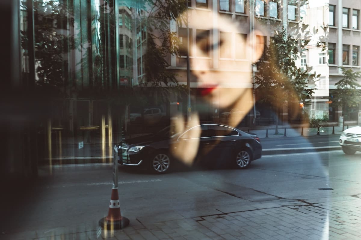 Lady thinking of a car