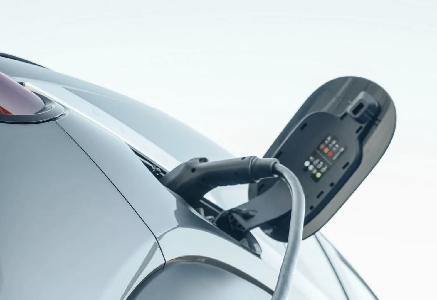Electric car plugged into a charger